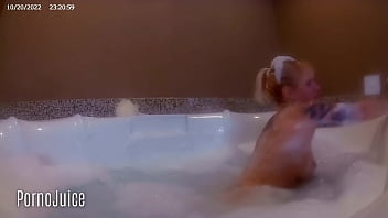 Petite blonde plays with huge bbc toy in the bath