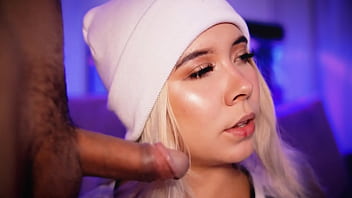 Blonde with a pretty face makes a living sucking cocks on the internet