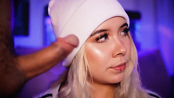 Blonde with a pretty face makes a living sucking cocks on the internet