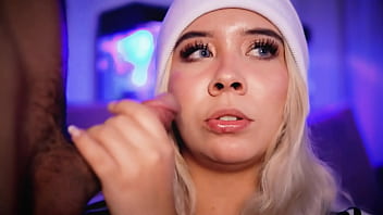 Blonde with a pretty face makes a living sucking cocks on the internet