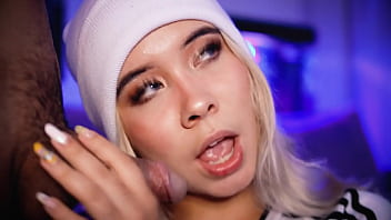 Blonde with a pretty face makes a living sucking cocks on the internet