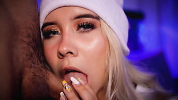 Blonde with a pretty face makes a living sucking cocks on the internet