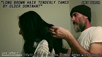 Long brown hair tenderly tamed by older dominant