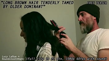 Long brown hair tenderly tamed by older dominant