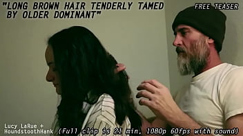 Long brown hair tenderly tamed by older dominant