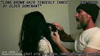 Long brown hair tenderly tamed by older dominant
