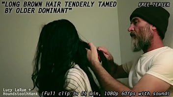 Long brown hair tenderly tamed by older dominant