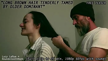 Long brown hair tenderly tamed by older dominant