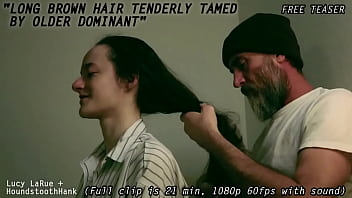 Long brown hair tenderly tamed by older dominant