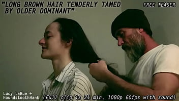 Long brown hair tenderly tamed by older dominant
