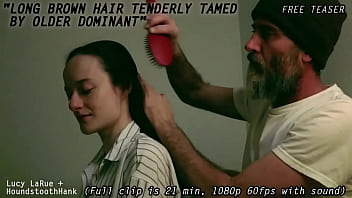 Long brown hair tenderly tamed by older dominant