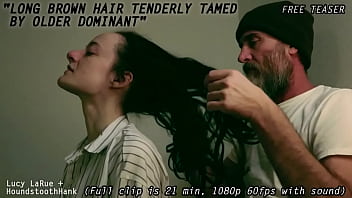 Long brown hair tenderly tamed by older dominant
