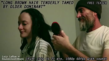 Long brown hair tenderly tamed by older dominant