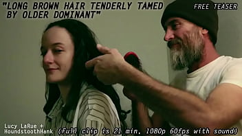 Long brown hair tenderly tamed by older dominant