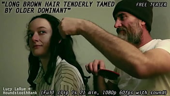 Long brown hair tenderly tamed by older dominant