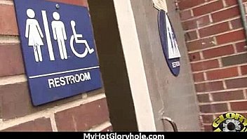 Ebony sucks off a big cock through a gloryhole 23