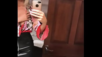 Sexy girl in leather skirt showing off