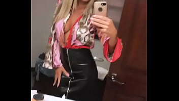 Sexy girl in leather skirt showing off