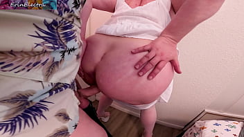 Stepmom in a white dress fucked against the wall