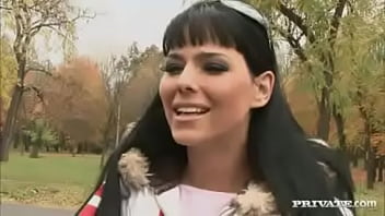 Sexy simony teases two guys while dancing in a cage