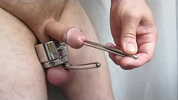 Transscrotal piercing
