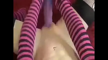 Big dildo self fucking in strippy socks