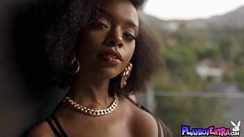 Glamorous busty black babe presenting a sensual striptease Glamorous busty black babe presenting a sensual striptease