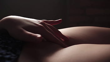 Beautiful teen caresses and slaps her tits and pussy closeup