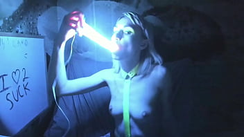 Sucking on a long bright rgb dildo by kelly copperfield