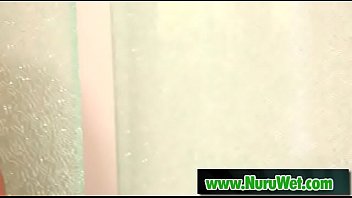 Japanesse masseuse sucking cock during nuru massage 03