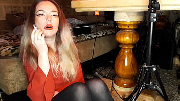 Mature asian woman smokes