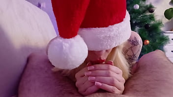 Miss santa sucks cock
