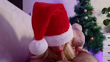 Miss santa sucks cock