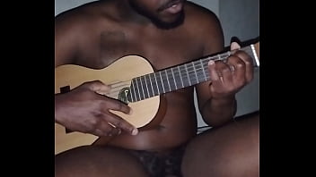 Translating other meanings of horns in the air while singing and playing guitar naked Translating other meanings of horns in the air while singing and playing guitar naked