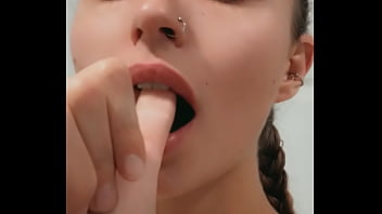 Naughty blonde teases and act like she has a dick in her mouth