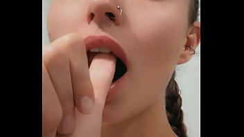 Naughty blonde teases and act like she has a dick in her mouth