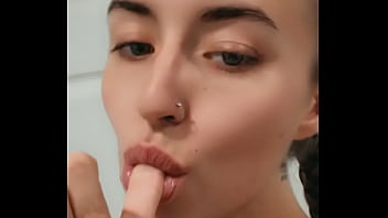 Naughty blonde teases and act like she has a dick in her mouth