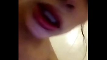 Hot brunette masturbates pussy in shower