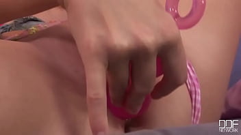 Filling her box with balls