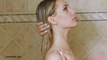 Aspiring blonde model enjoys a sensual bath