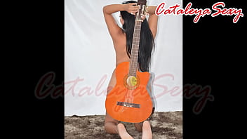 Model posing in different outfits and naked with a guitar really sensual