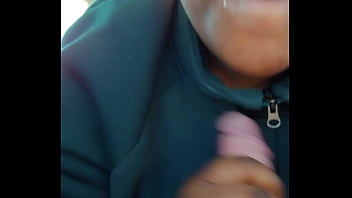 Slut sucks dick and catches nut while her man is inside the house