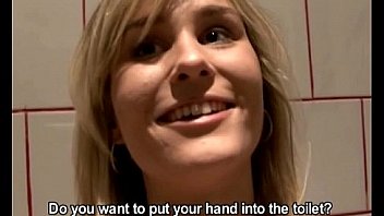 Blonde girl fisting pussy in toilets room
