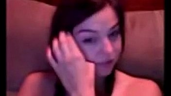 Pretty young girl rubs her pussy