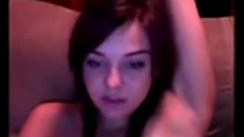 Pretty young girl rubs her pussy