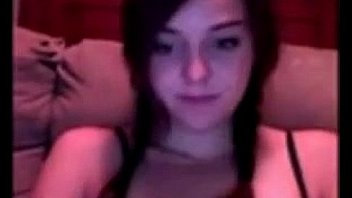 Pretty young girl rubs her pussy