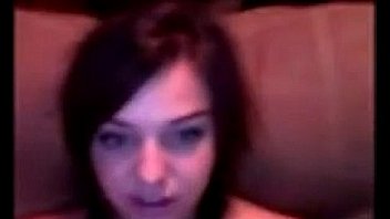 Pretty young girl rubs her pussy