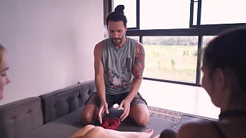 Two girls tied up and giving head