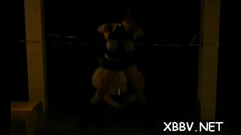 Enchanting babe is doing a strip tease