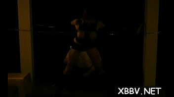 Enchanting babe is doing a strip tease